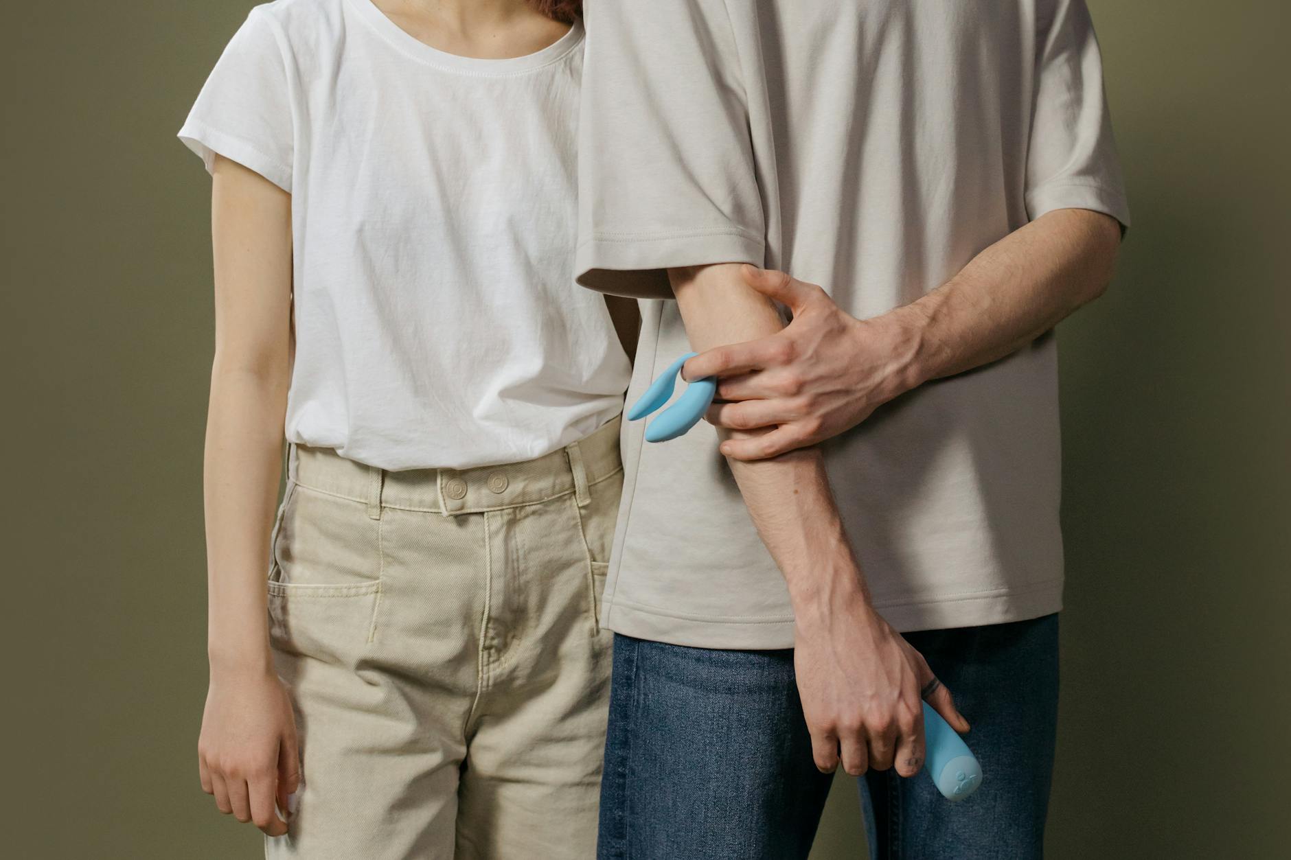 A young couple standing together indoors, reconnecting with intimacy and communication.